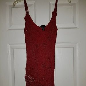 Red asymmetrical knit shirt